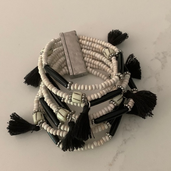 Jewelry - Silver tone and tassel bracelet